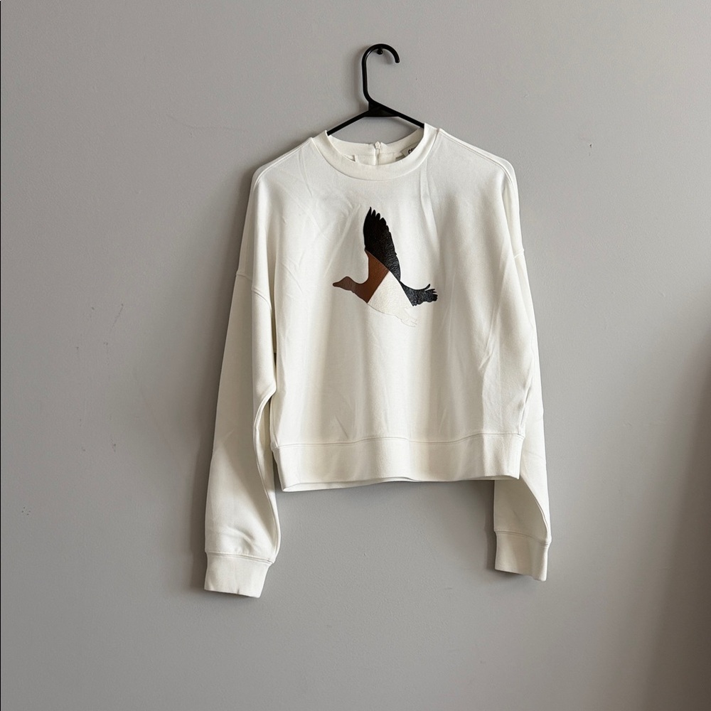 Cropped Cream Sweatshirt with Flying Duck Graphic